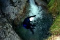 Jumping across waterfalls on Canyoning